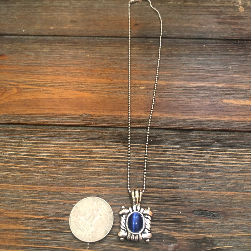 Silver tone chain and pendant blue cat’s eye stone